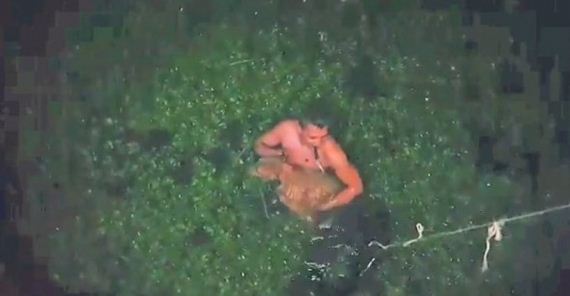 Police Officer Jumps into Wetland to Save Dog