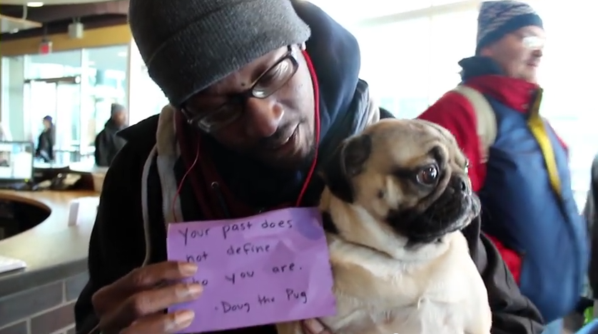 This Pug Gives Strangers Notes Of Encouragement – Their Reaction Says It All