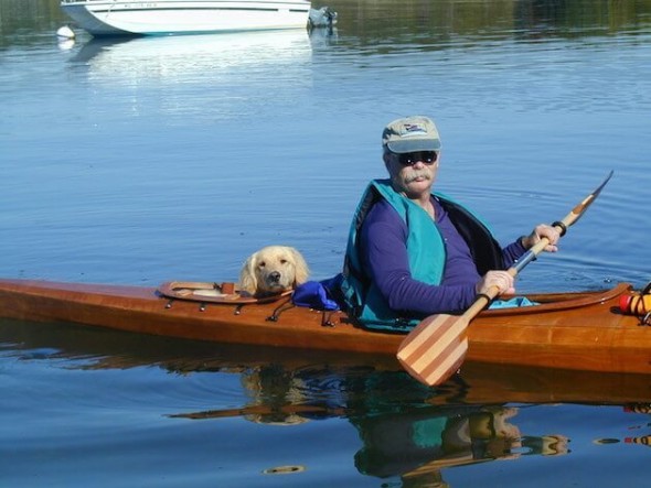 Man Creates Special Kayak to Take Dogs on Adventures