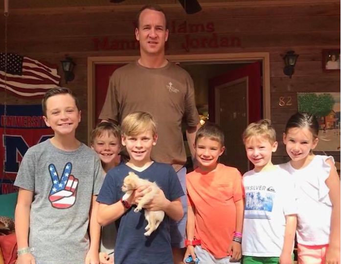 Peyton Manning adopts tiny, two-pound rescue pup