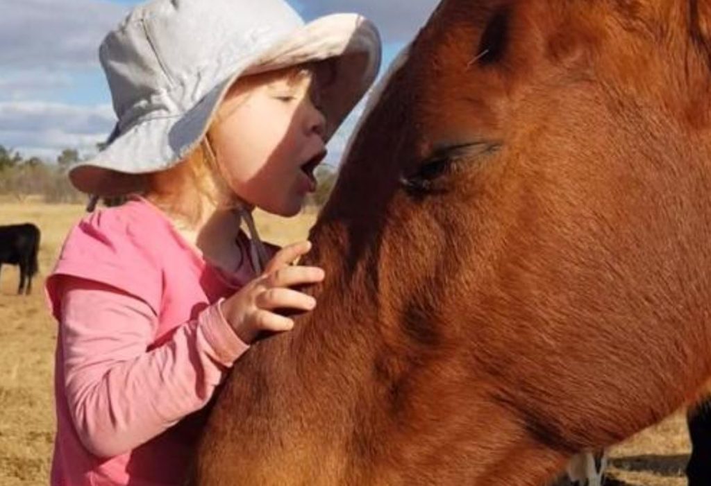 3-Year-Old Girl Gently Sings Horses To Sleep