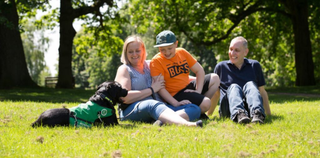 Meet Cyril: A Black Labrador Who Assist Boy With Autism
