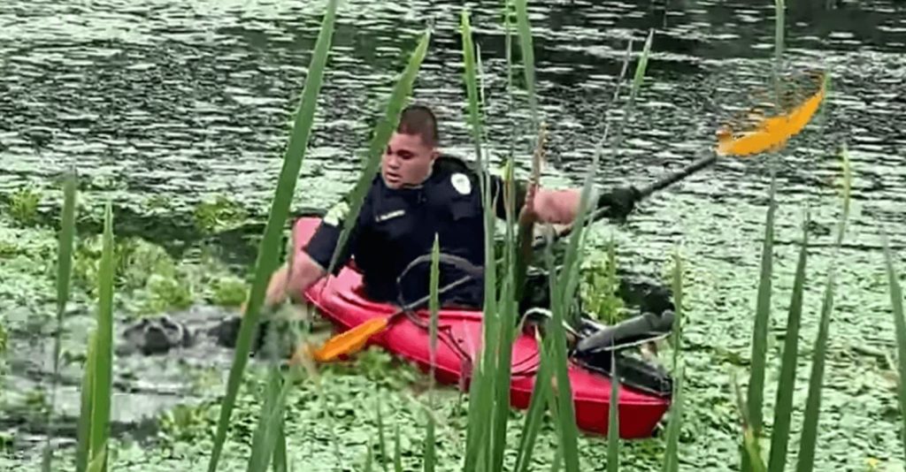 Officers Use Kayak To Rescue Dog From Muddy Pond